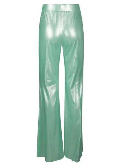 The Andamane Shiny Jersey Gaia Flare Pants In Green