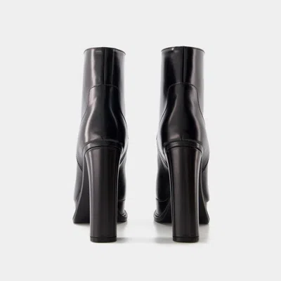 Alexander Mcqueen Elevated Platform Boots With 12 Cm Heel For Women In Black
