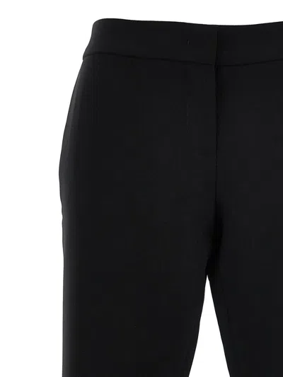 Moschino Flared High Waist Trousers With Front Crease In Black