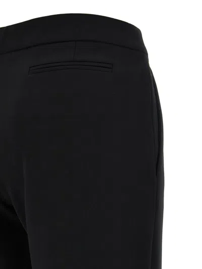 Moschino Flared High Waist Trousers With Front Crease In Black