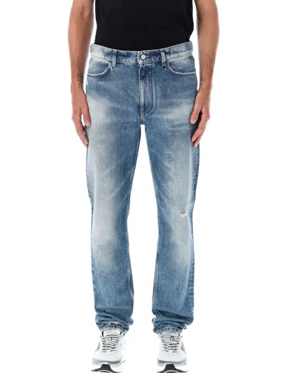 Givenchy Washed Denim Tapered Leg Jeans With Contrast Stitching In Ocean Blue