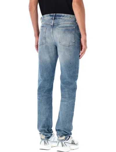Givenchy Washed Denim Tapered Leg Jeans With Contrast Stitching In Ocean Blue