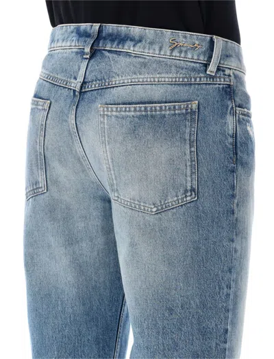 Givenchy Washed Denim Tapered Leg Jeans With Contrast Stitching In Ocean Blue
