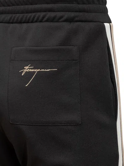 Shop Ferragamo Salvatore   Pants In Black