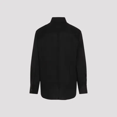 Jil Sander Wool Coat With Long Sleeves And Curved Hem In Black