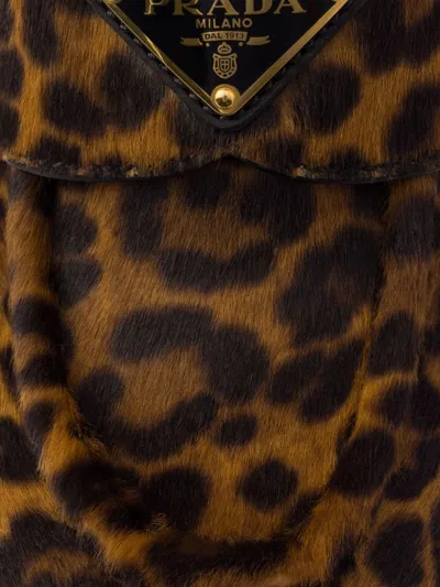 Prada Leopard Calf Hair Triangle Loafers In Miele