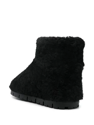 Prada Black Shearling Ankle Boots In Black