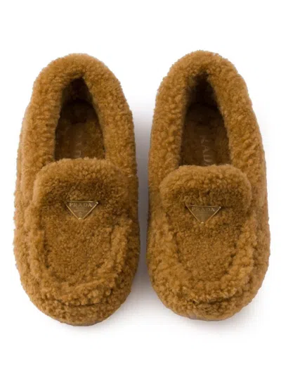 Prada Triangle Logo Shearling Loafers In Brown