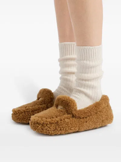 Prada Triangle Logo Shearling Loafers In Brown