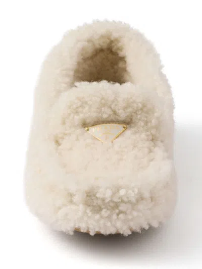 Prada Triangle Logo Shearling Loafers In White