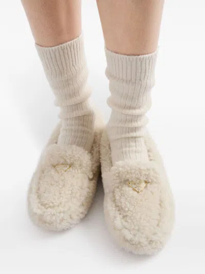 Prada Triangle Logo Shearling Loafers In White