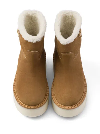 Prada Triangle Logo Suede Snow Boots In Cannella