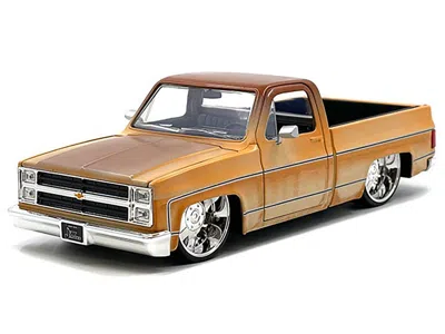 Diecast Model Jada 1985 Chevrolet C-10 Pickup Truck Yellow With Brown Top (rusted) And Jd3 Wheels "just Trucks" Series