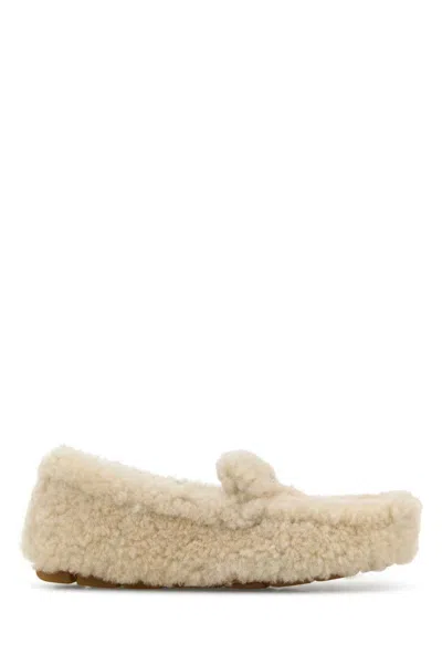 Prada Triangle Logo Shearling Loafers In White