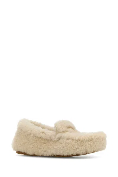 Prada Triangle Logo Shearling Loafers In White