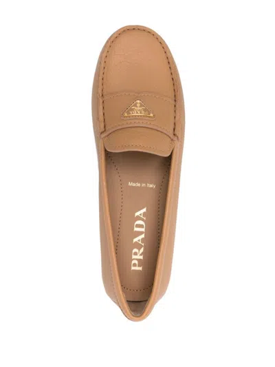 Prada Triangle-logo Leather Loafers In Beige