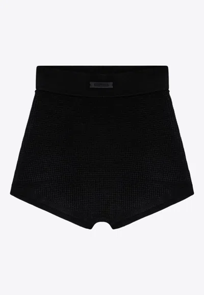 Essentials Embossed Logo Knit Shorts In Black