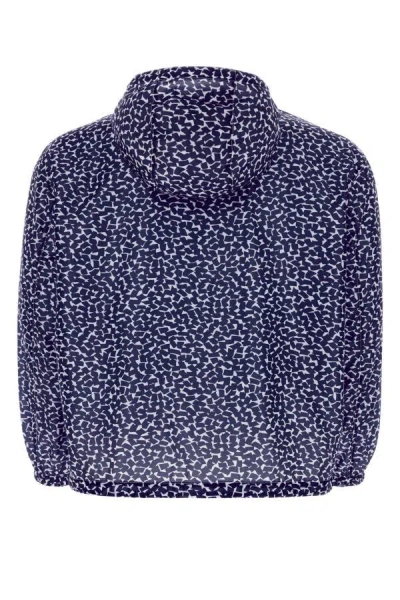 Prada Chest Placement Patterned Lightweight Windbreaker In Blue