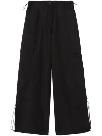 Palm Angels Wide-leg Nylon Parachute Pants With Adjustable Cuffs In Black