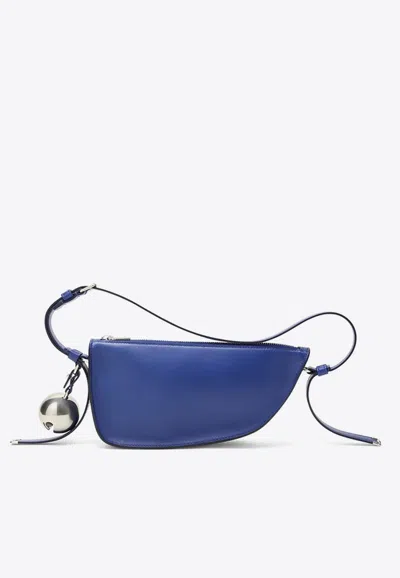 Burberry Leather Shield Sling Shoulder Bag With Silver-tone Charm In Blue