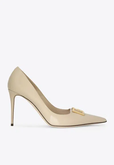 Dolce & Gabbana Lollo 60 Dg Logo Pumps In Patent Leather In Beige