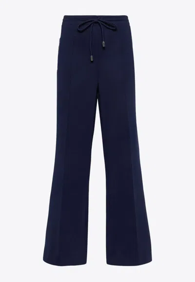 Jw Anderson Bootcut Track Pants In Blue