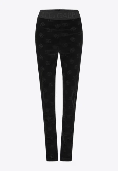 Dolce & Gabbana Flocked Jersey Leggings With All-over Dg Logo In Black