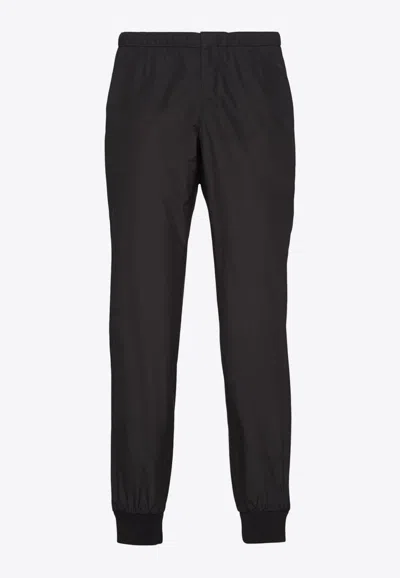 Prada Technical Cotton And Re-nylon Pants In Black