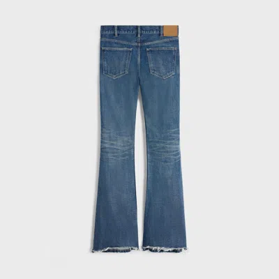 Shop Celine Low-rise Flared Jeans In Blue