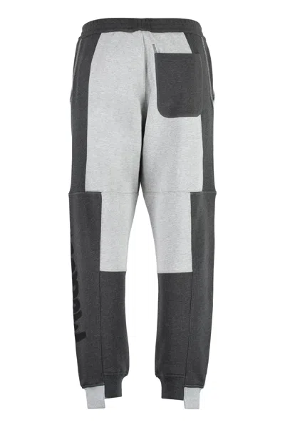 Alexander Mcqueen Logo Printed Colourblock Track Pants In Grey