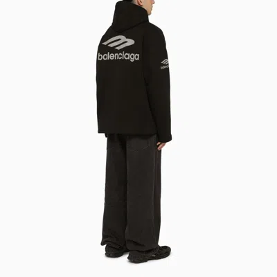 BALENCIAGA BRAVE THE ELEMENTS IN THIS WATERPROOF SPORTS HOODIE FOR MEN 