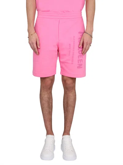 Alexander Mcqueen Bermuda Shorts With Graffiti Logo Print In Pink