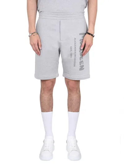 Alexander Mcqueen Men Bermuda Shorts With Graffiti Logo Print In Gray