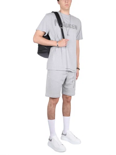 Alexander Mcqueen Men Bermuda Shorts With Graffiti Logo Print In Gray