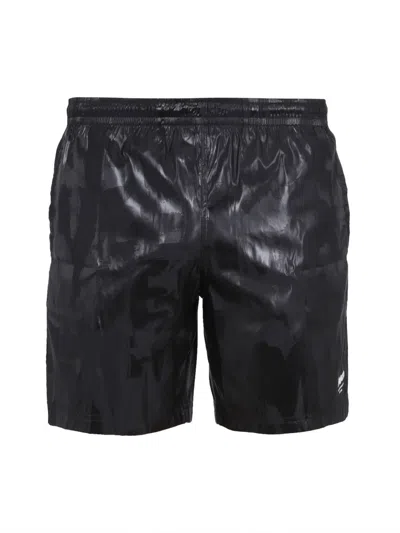 Alexander Mcqueen Solid Color Swim Shorts With Graffiti Print In Black