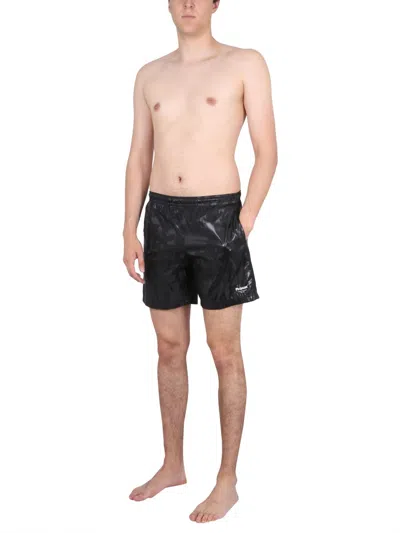 Alexander Mcqueen Solid Color Swim Shorts With Graffiti Print In Black