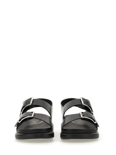 Alexander Mcqueen Black Slide Sandals With Embossed Logo In Leather Man In Black