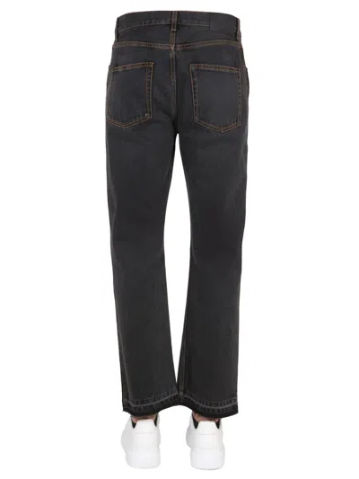 Alexander Mcqueen Men's Raw Cut Jeans In Black