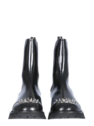Alexander Mcqueen Men Studded Boot In Black