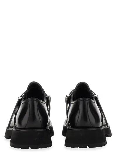 Alexander Mcqueen Studded Strap Derby Loafers In Black