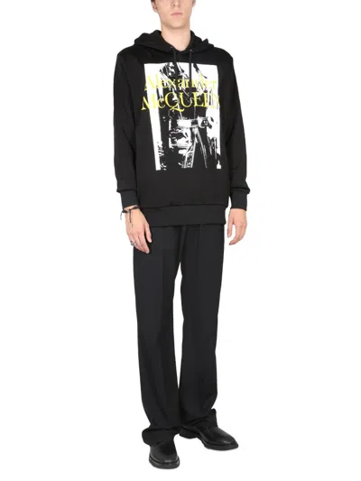Alexander Mcqueen Logo-print Long-sleeved Hoodie In Black
