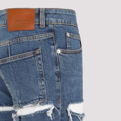 Alexander Mcqueen Low-rise Distressed Jeans In Blue