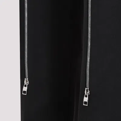 Alexander Mcqueen Wool Flared Pants In Black