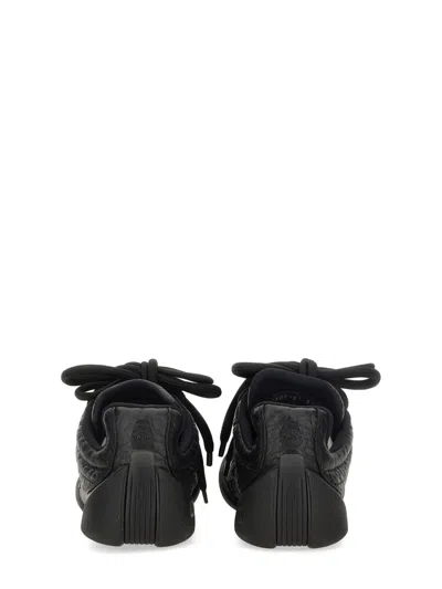 Alexander Mcqueen Flexion Rubber-trimmed Textured-leather Sneakers In Black