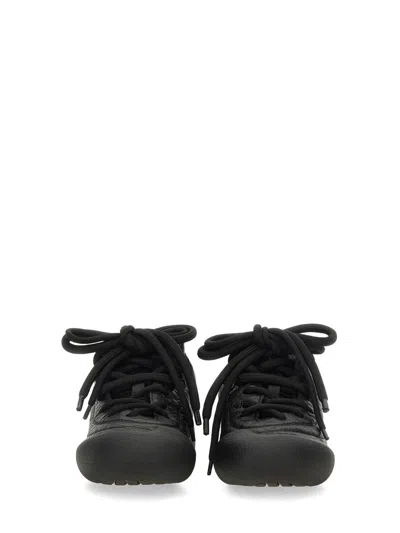 Alexander Mcqueen Flexion Rubber-trimmed Textured-leather Sneakers In Black