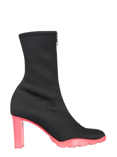Alexander Mcqueen Slim Tread Boots With Enameled Leather Heel In Black