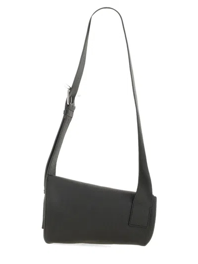 Alexander Mcqueen T-bar Sling Pebbled-leather Shoulder Bag In Black