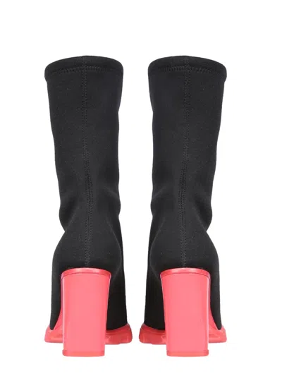 Alexander Mcqueen Slim Tread Boots With Enameled Leather Heel In Black