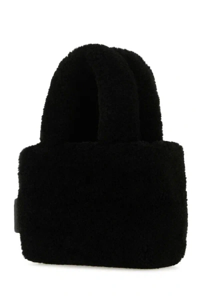 Amina Muaddi Shearling Handbag With Twin Handles And Structured Silhouette In Black