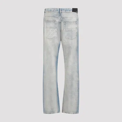 Amiri Stack Distressed Slim-leg Jeans In Blue